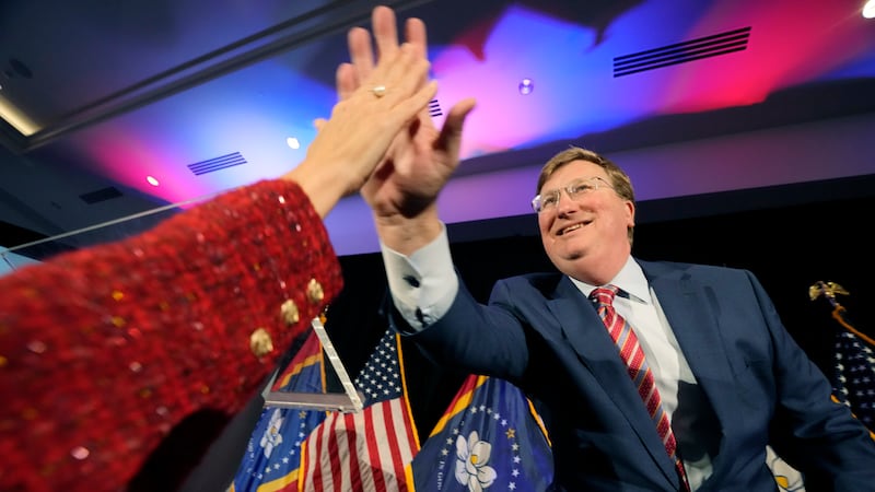 Mississippi Republican Gov. Tate Reeves greets a supporter at a election night party in...