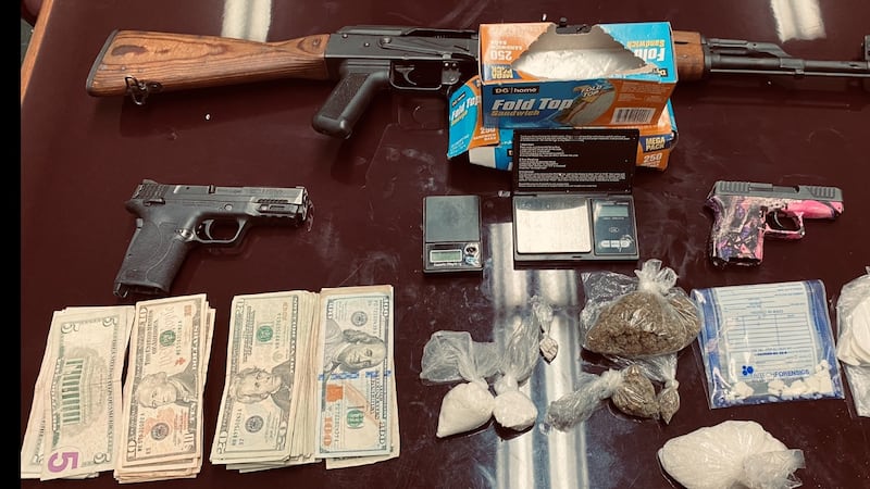 The sheriff's office seized various drugs, firearms and cash from one Columbia home searched...