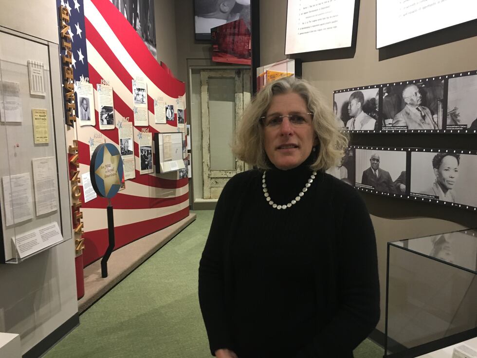 Mississippi Department of Archives and History Director Katie Blount stands in one of eight...