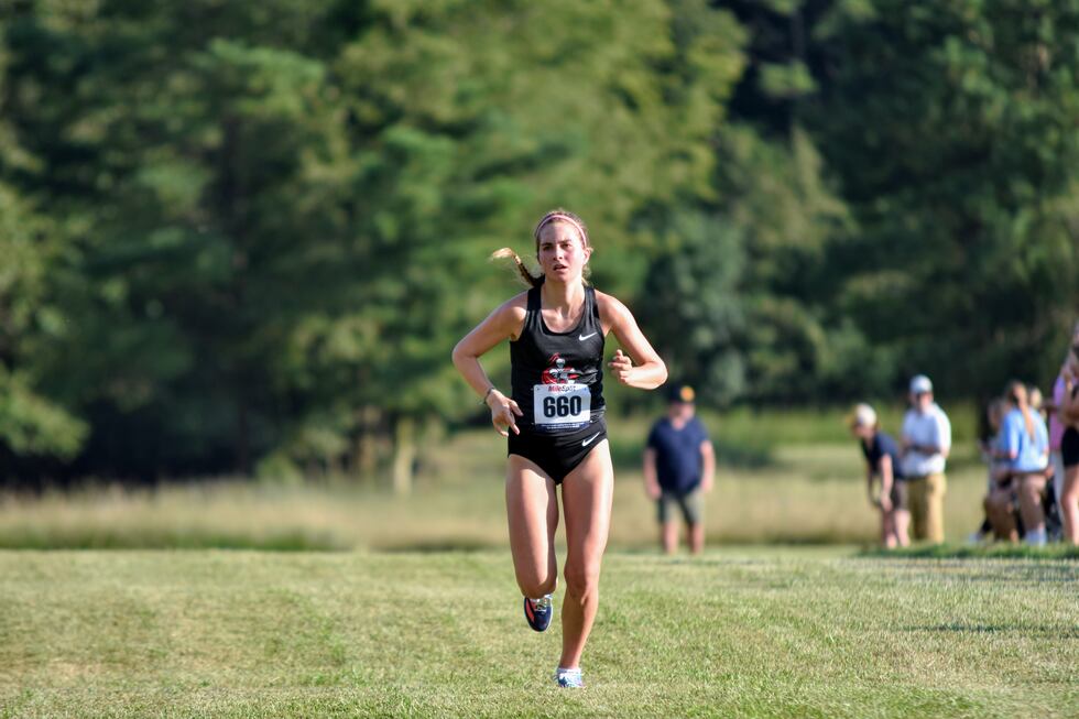 Lina May brought home William Carey University's first-ever women's cross country individual...
