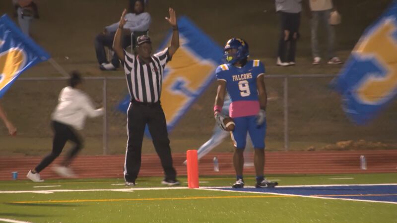 Gavin Griffin stands in the end zone after scoring a touchdown in Velma Jackson's game against...